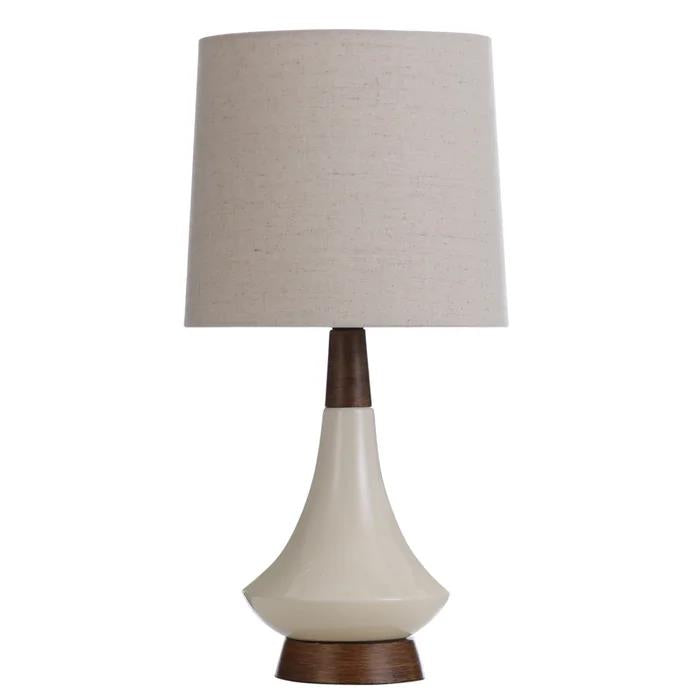 Beige table lamp with a wooden base and a cylindrical fabric shade.