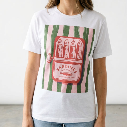 Person in a sardine graphic T-shirt with pink and green stripes.