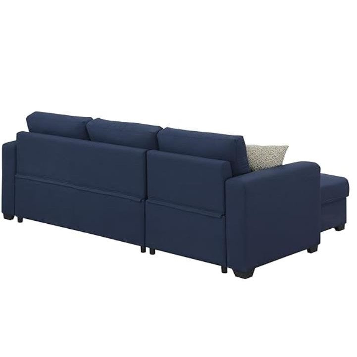 Blue sectional sofa with cushions, rear view.