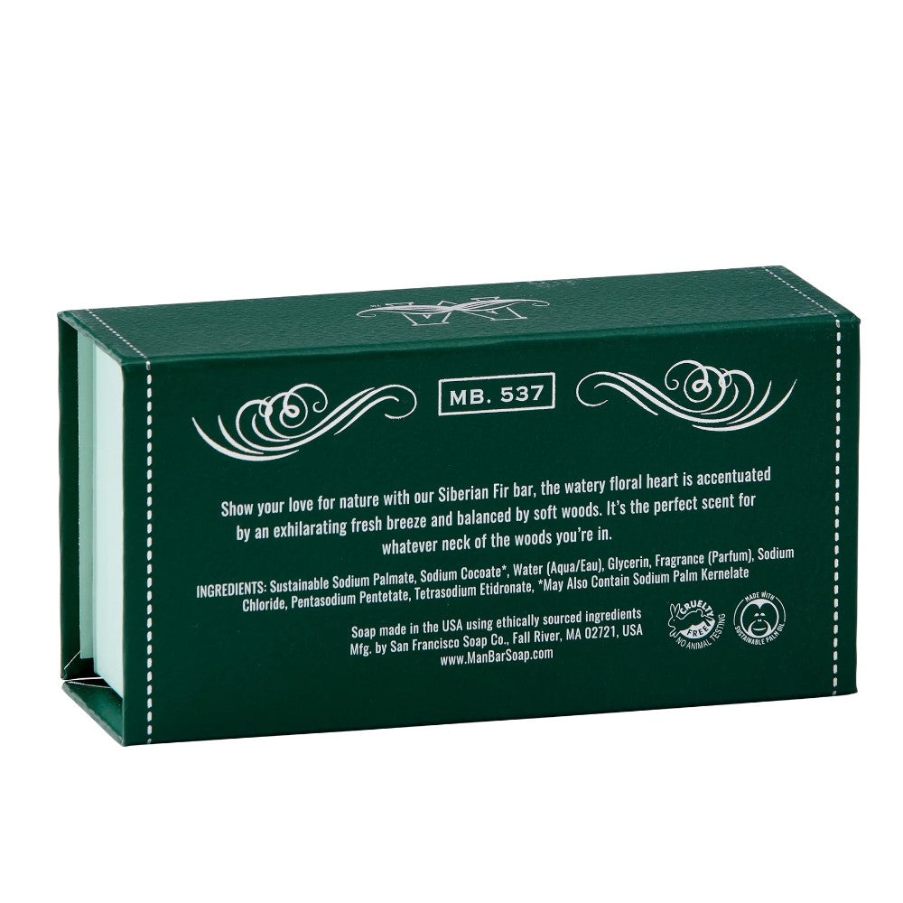 Green soap box with decorative text and floral accents.