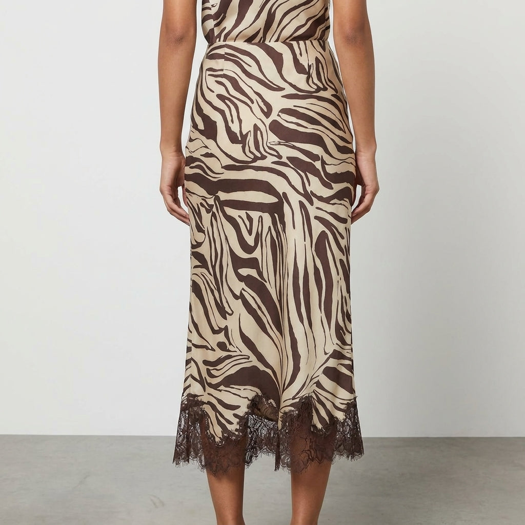 Brown zebra-print dress with lace hem, rear view.