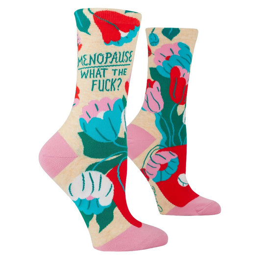 Colorful socks with flowers and bold text about menopause.