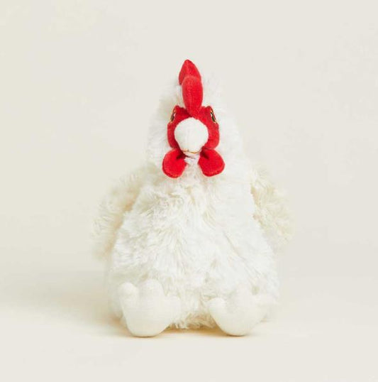 Fluffy white plush chicken with a red comb.