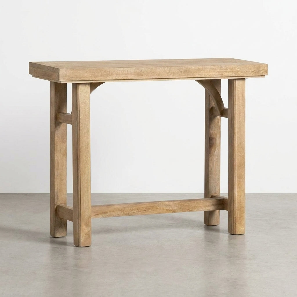 Simple wooden console table with arch detailing.