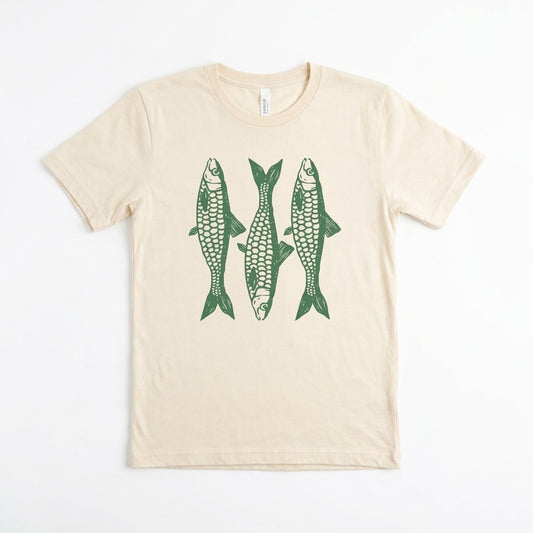 Beige T-shirt featuring three green fish illustrations.