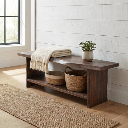 Rustic wooden bench with a shelf underneath.