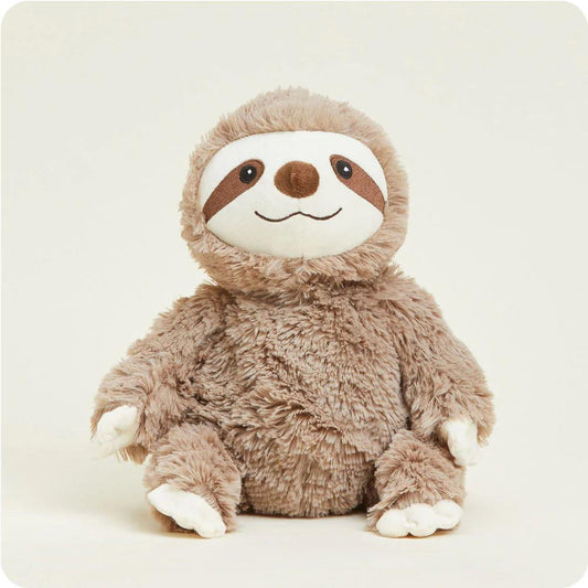 Fluffy sloth plush toy with a smiling face.