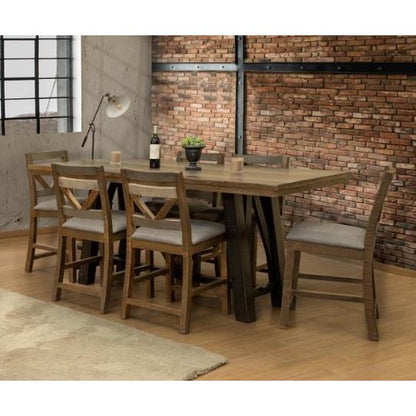 Rustic dining area with wooden table and chairs, brick wall backdrop.