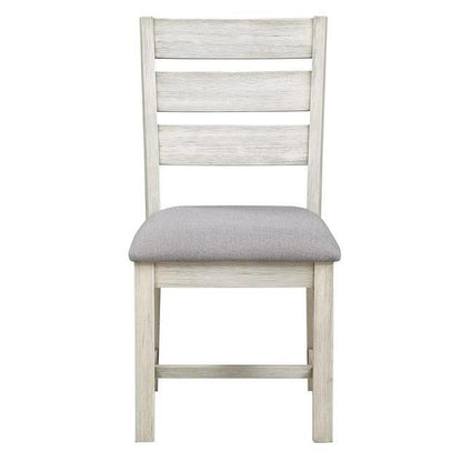 Wooden chair with gray cushioned seat.