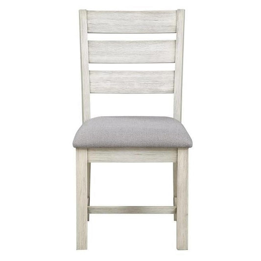 Wooden chair with gray cushioned seat.