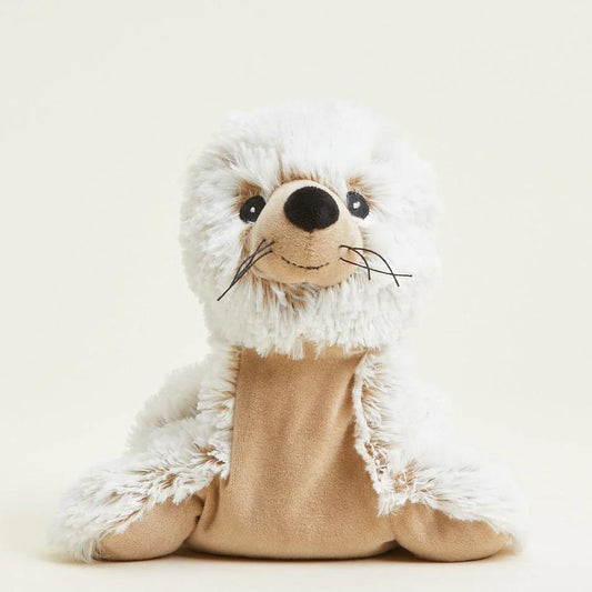 Cute fluffy seal plushie with a friendly smile.