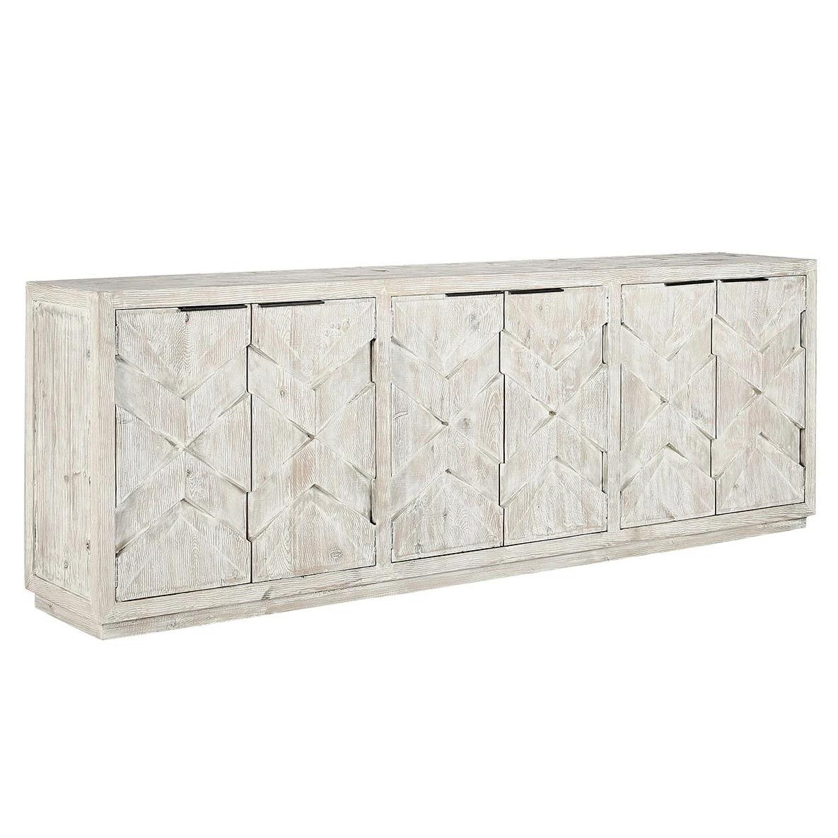 Wooden sideboard with geometric patterned doors in a light finish.