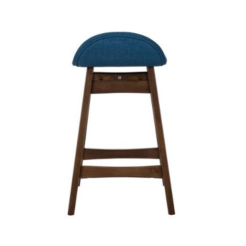 Wooden stool with blue cushioned seat.