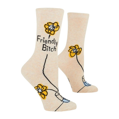 Beige socks with yellow flower and playful black text design.