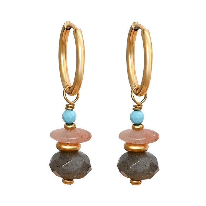 Gold hoop earrings with colorful stone accents.