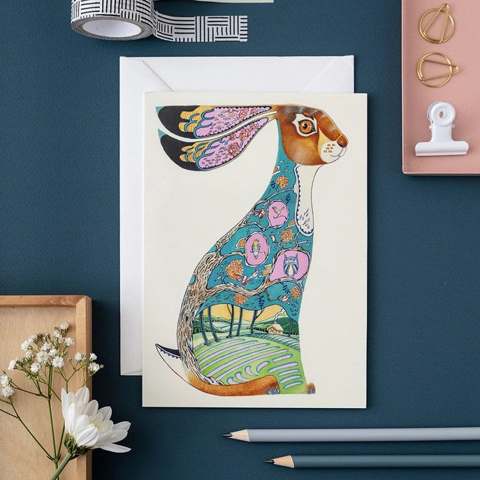 Colorful illustrated hare card with decorative patterns.