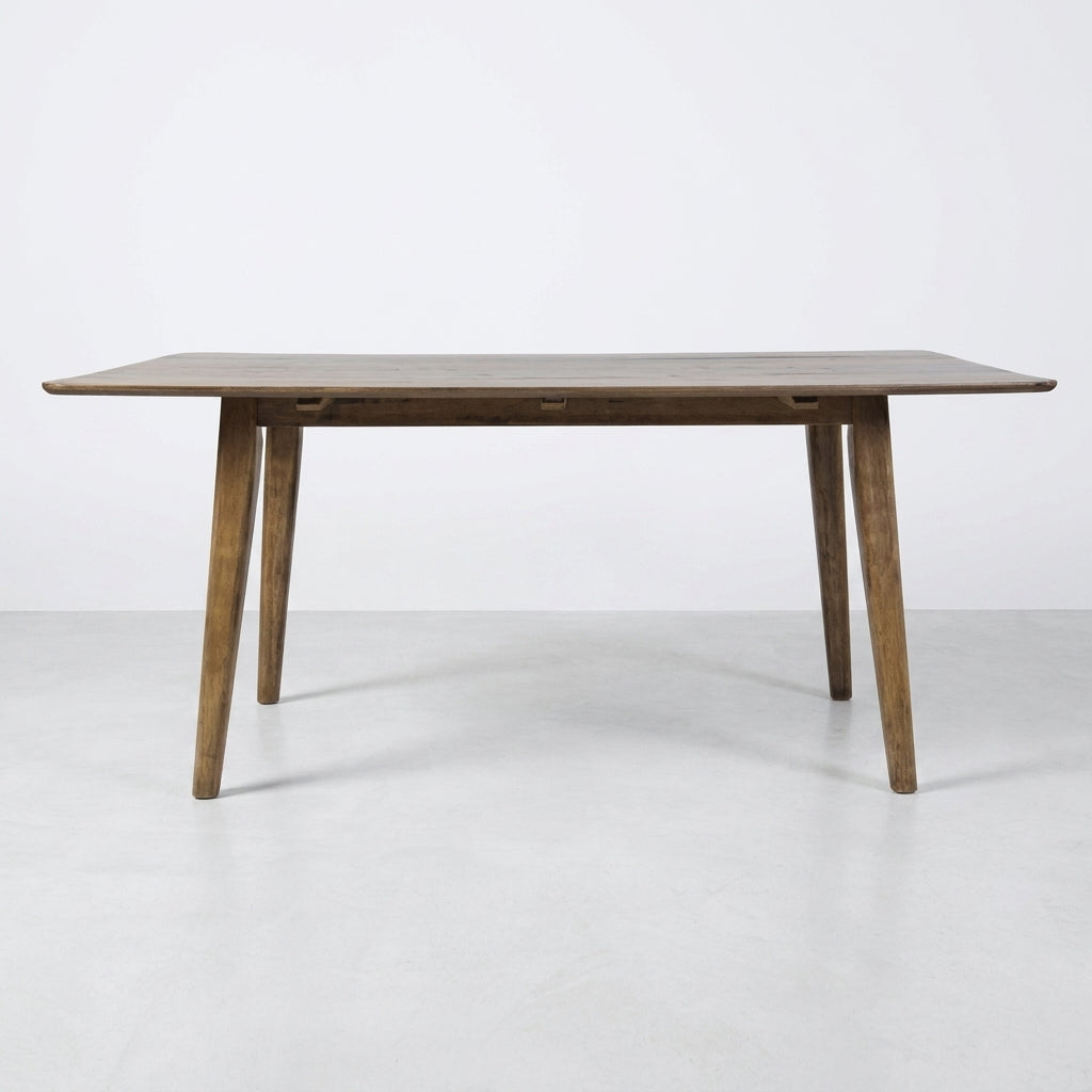 Wooden dining table with clean lines and tapered legs.