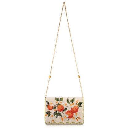 Decorative bag with floral and fruit embroidery, gold chain strap.