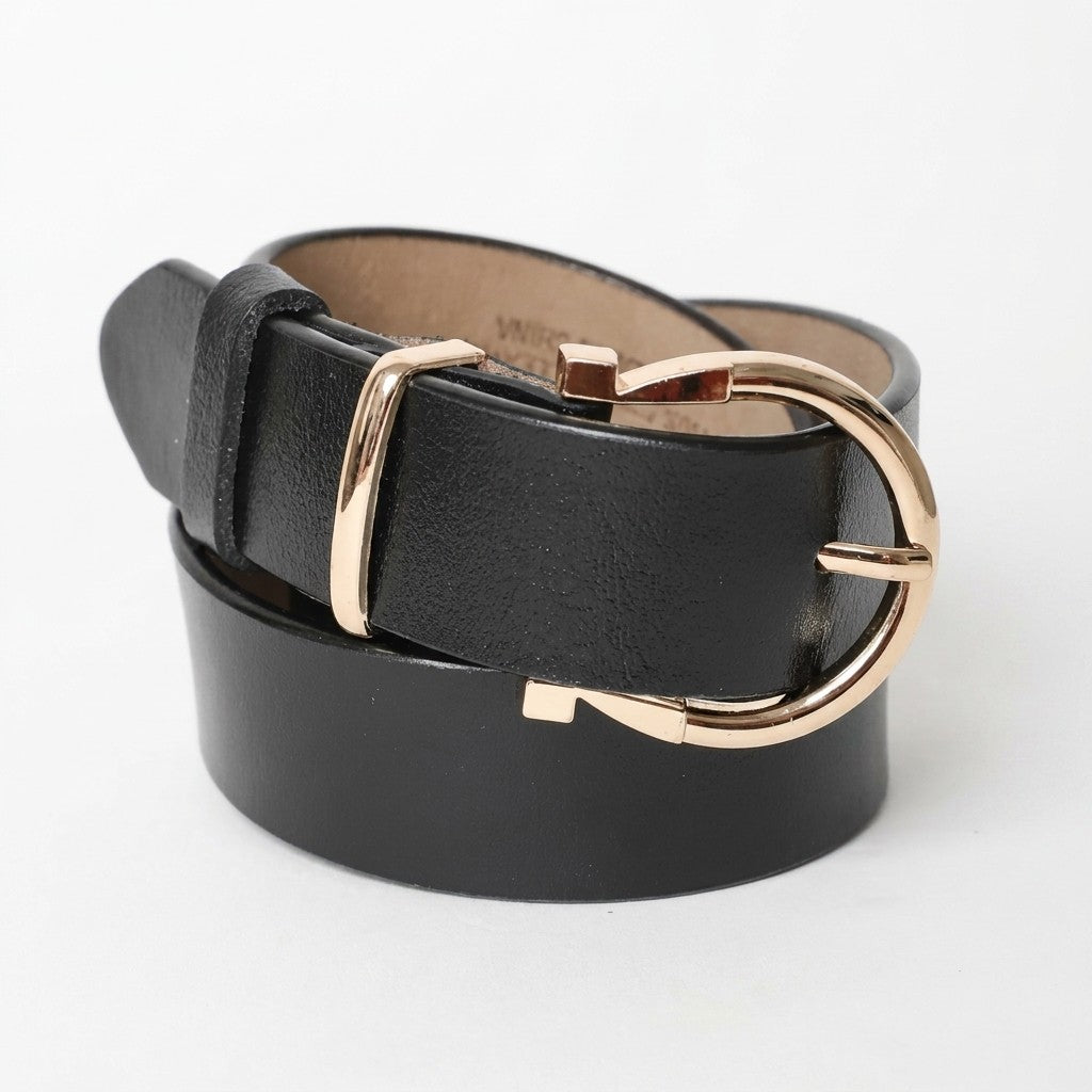 Black leather belt with a gold oval buckle on white background.