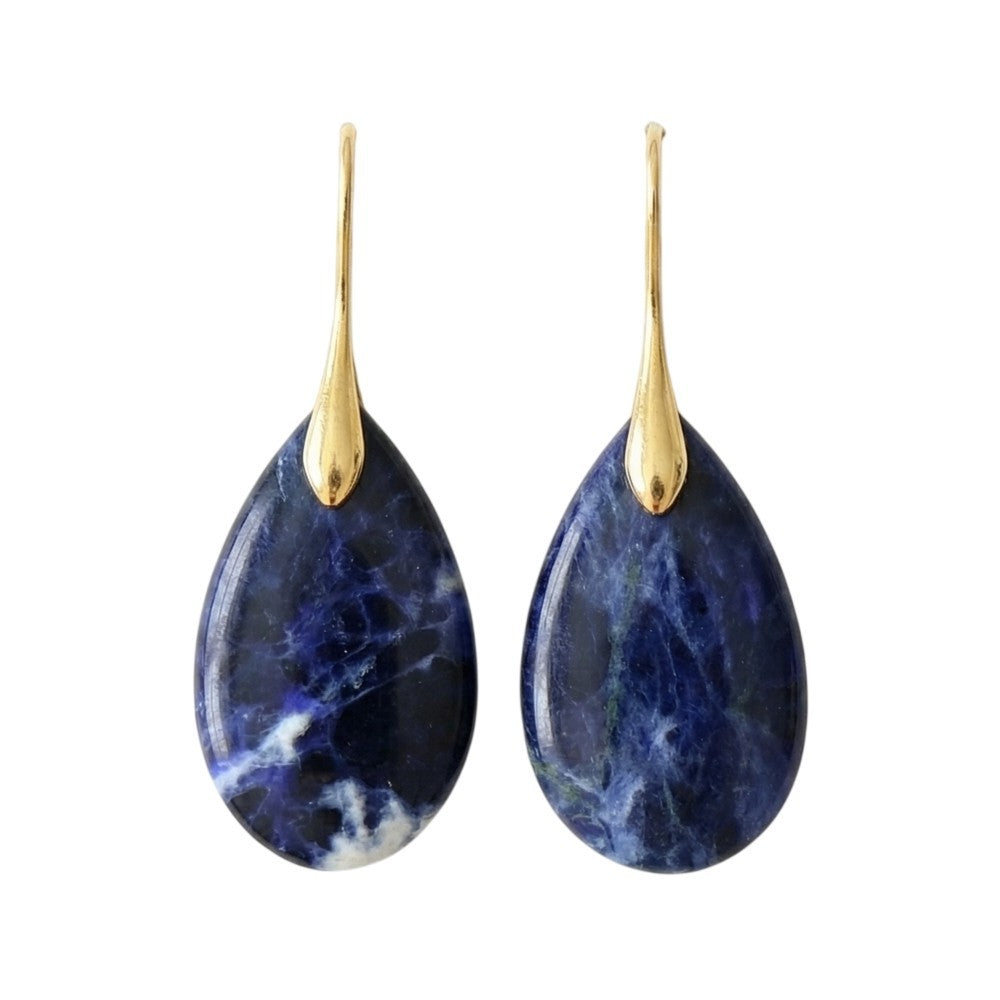 Gold-topped blue teardrop stone earrings.