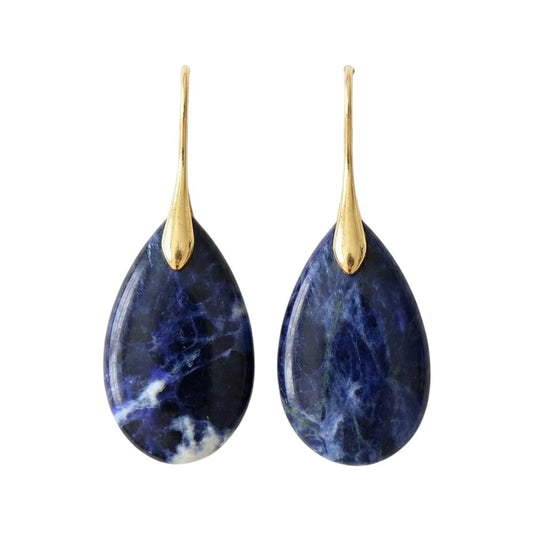 Gold-topped blue teardrop stone earrings.