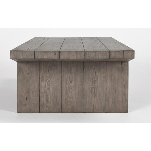 Wooden block coffee table with a rustic finish.