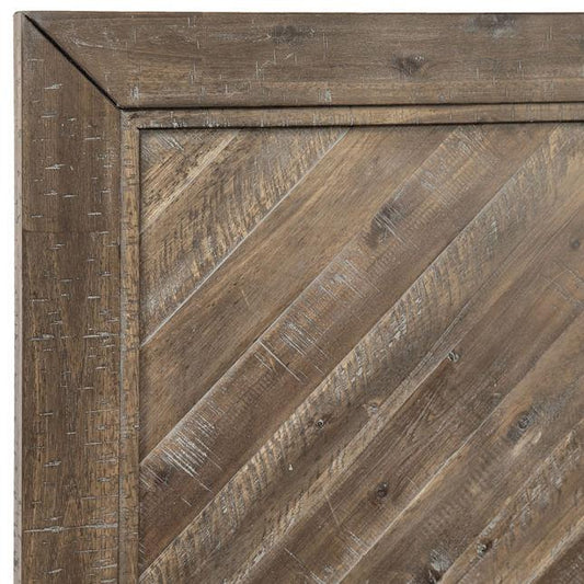 Reclaimed wood with diagonal patterns and a rustic frame.