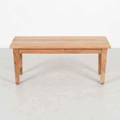 Wooden bench with simple, sturdy design.