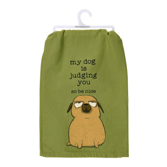 Green towel with a cartoon dog and text: "my dog is judging you, so be nice."