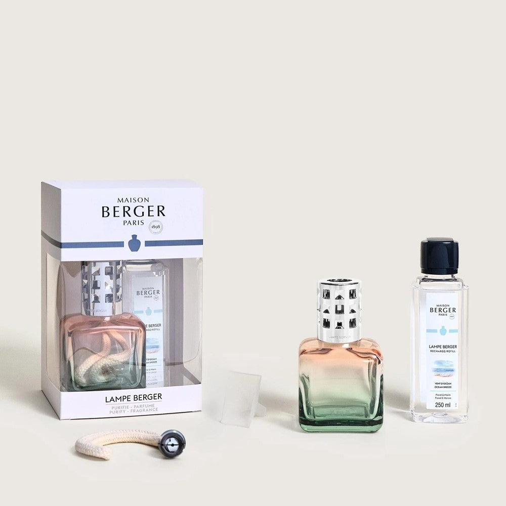 Maison Berger fragrance lamp and oil set on a light background.