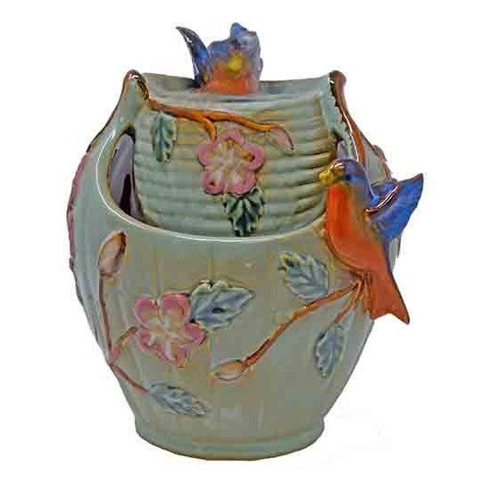 Colorful floral vase with bird design.