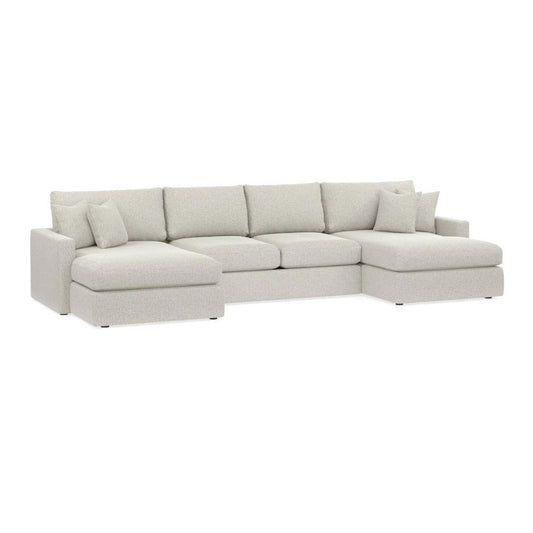 Light gray sectional sofa with clean lines and plush cushions.