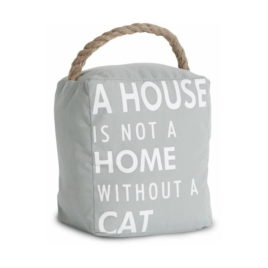 Gray doorstop with "A HOUSE IS NOT A HOME WITHOUT A CAT" text and a rope handle.