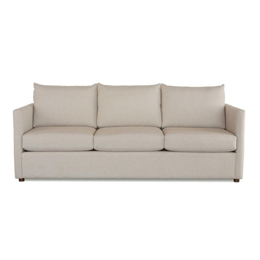 Beige sofa with three cushions on a white background.