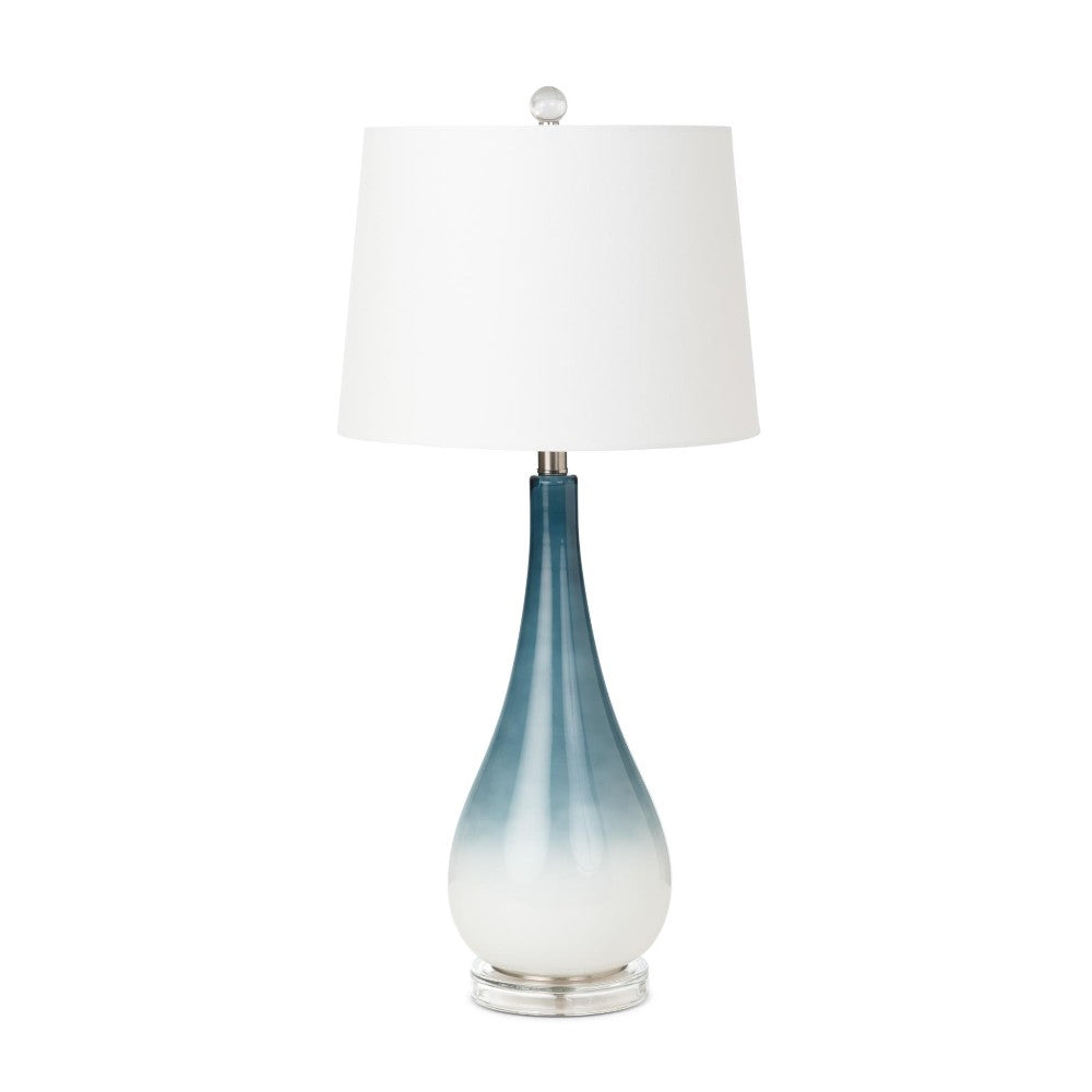 Elegant lamp with blue gradient base and white shade.