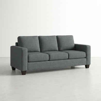 Gray, three-seater sofa with square arms on a white background.