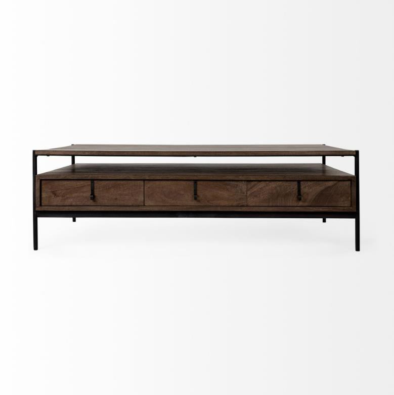 Wooden coffee table with black frame and three drawers.