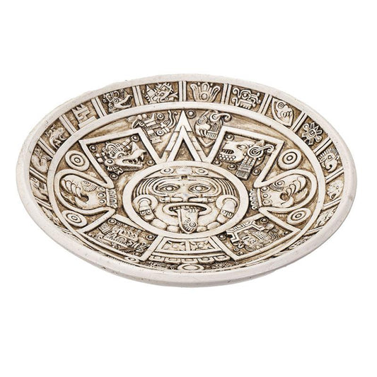Intricate Mayan-style circular plate with detailed carvings.