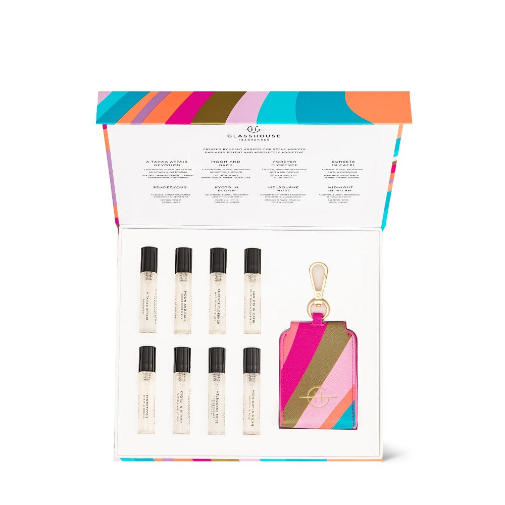 Colorful perfume sampler set with eight vials and a striped keychain.