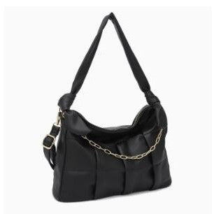 Black handbag with chain detail and adjustable strap.