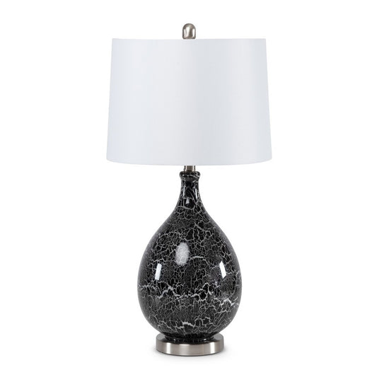 Black and white ceramic table lamp with a white shade.