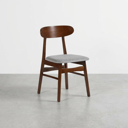 Mid-century modern chair with wooden frame and gray cushioned seat.