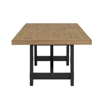 Wooden table with black metal legs, viewed from the end.