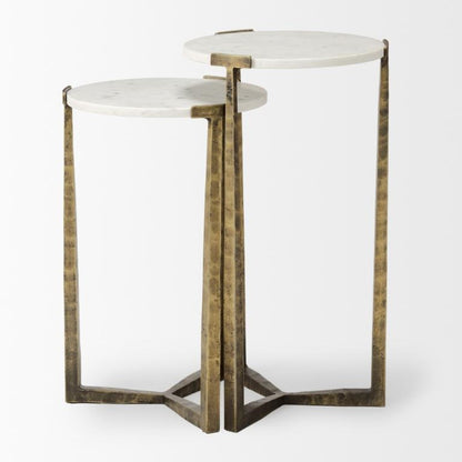 Two-tiered round marble nesting tables with gold metal legs.
