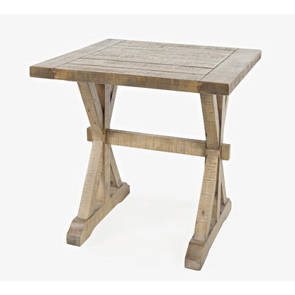 Rustic wooden table with a sturdy cross-base design.