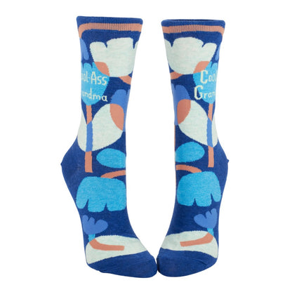 Blue socks with floral pattern, text reads "Cool Grandma".
