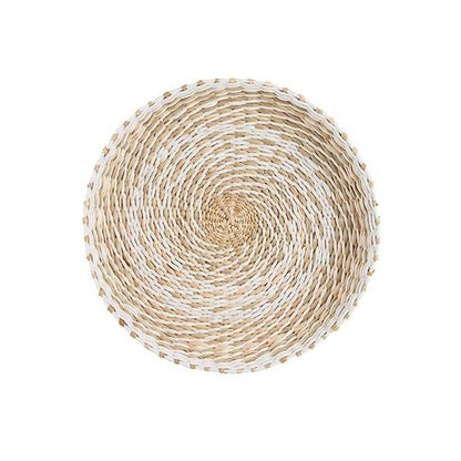 Round woven basket with a spiral pattern.