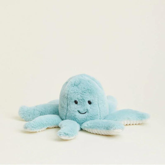 Soft blue plush octopus with a smiling face.