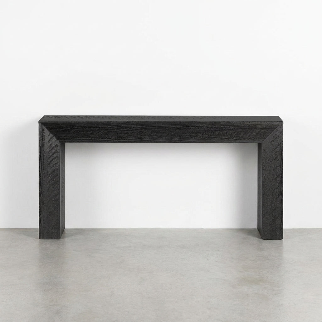 Black wooden bench against a white background.