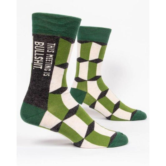 Geometric green socks with a humorous message.